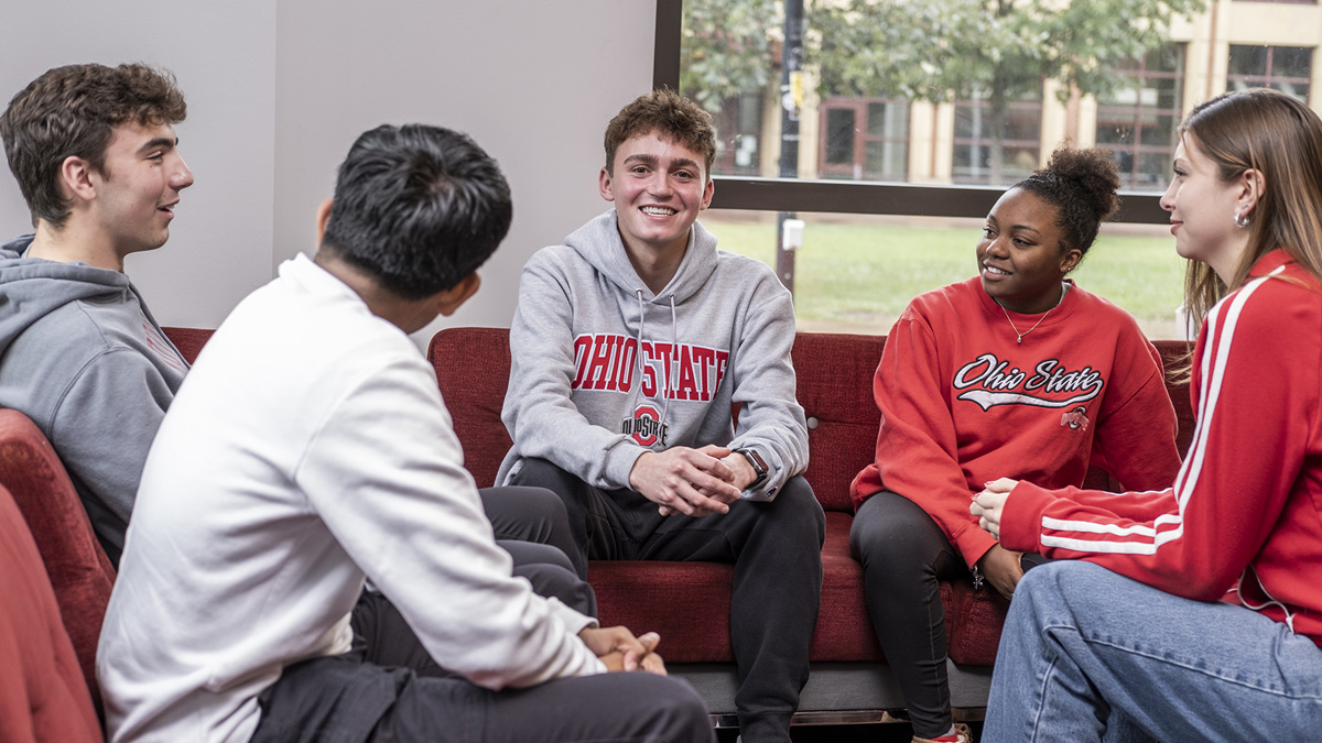 Students talking in a residence hall