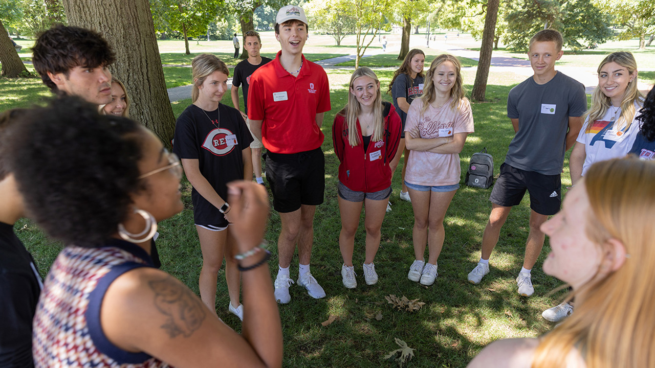 Students attending orientation on the oval