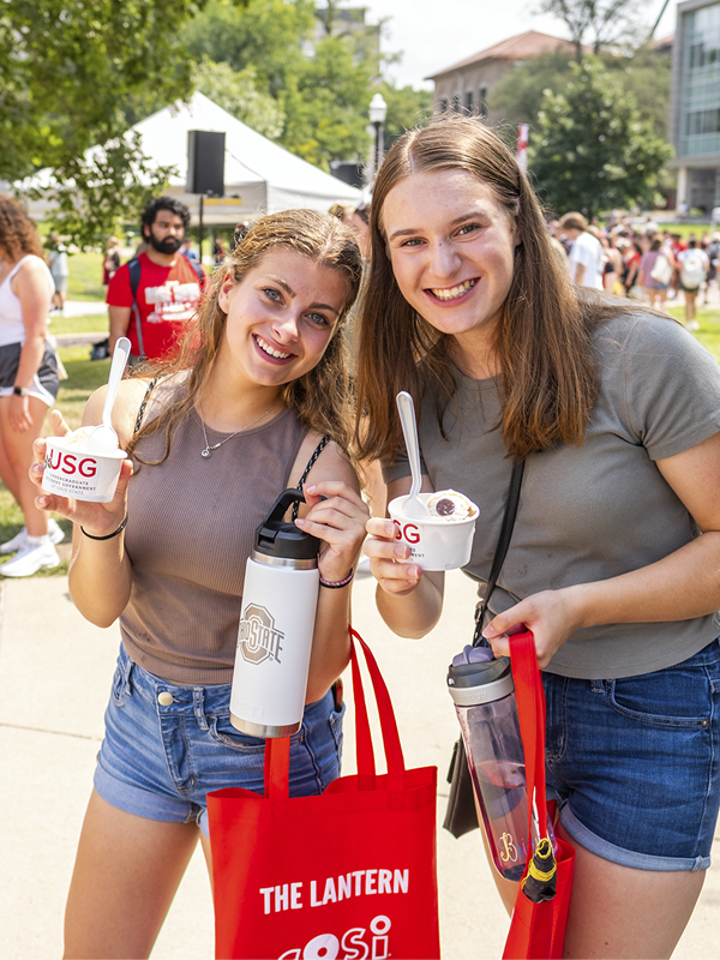 Two students eating ice cream at Buck-I-Frenzy